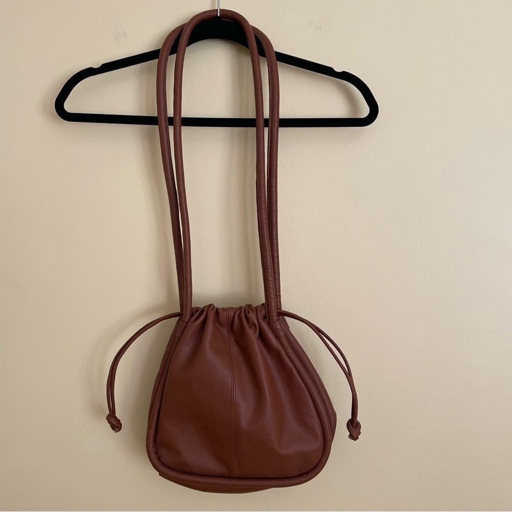 Saddle River Pebbled Leather Double Strap Drawstring Handbag Brown